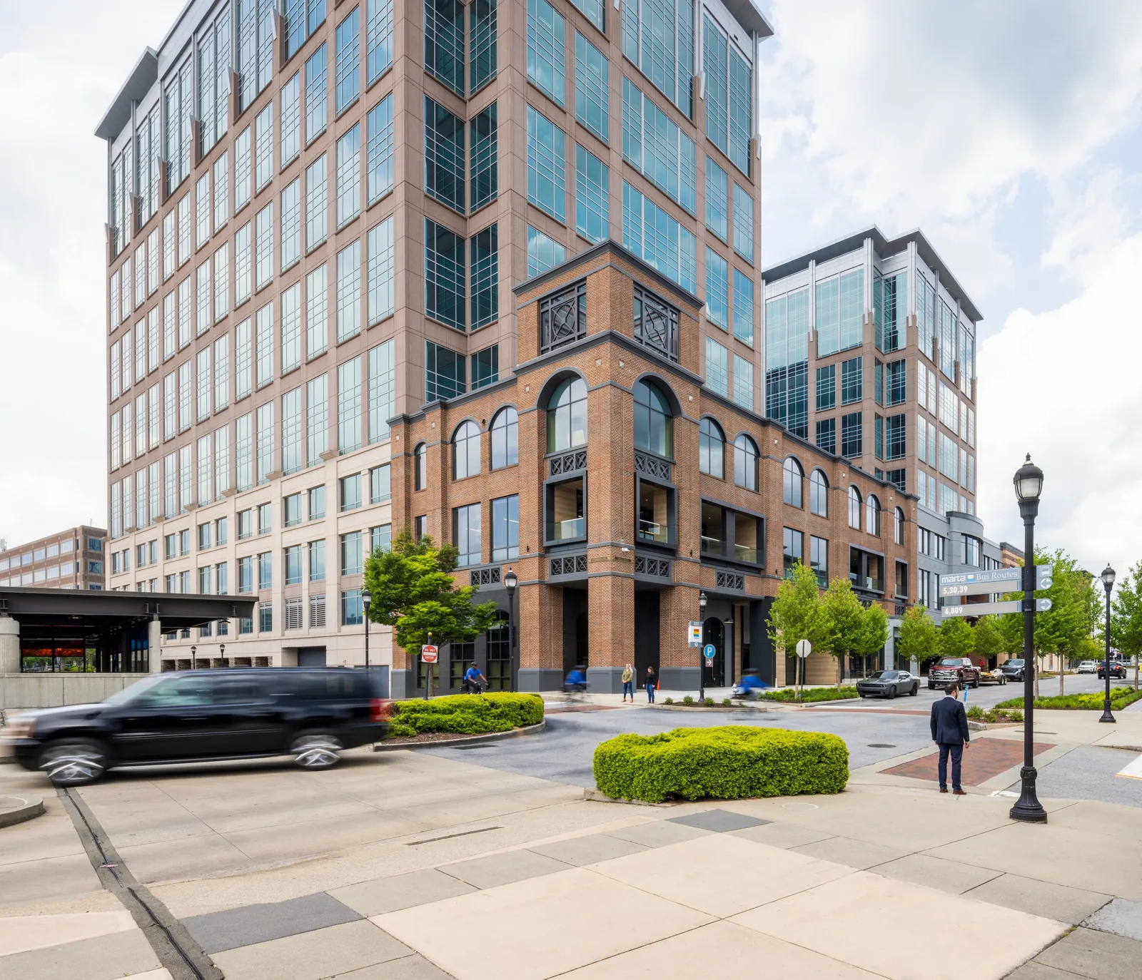 UPTOWN Atlanta's refreshed Main Street and two campus towers in daylight